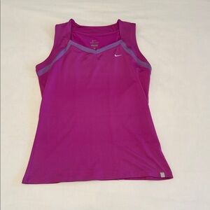 Nike fuchsia sleeveless top size large.  EUC. Purple trim. Sculptured fit.